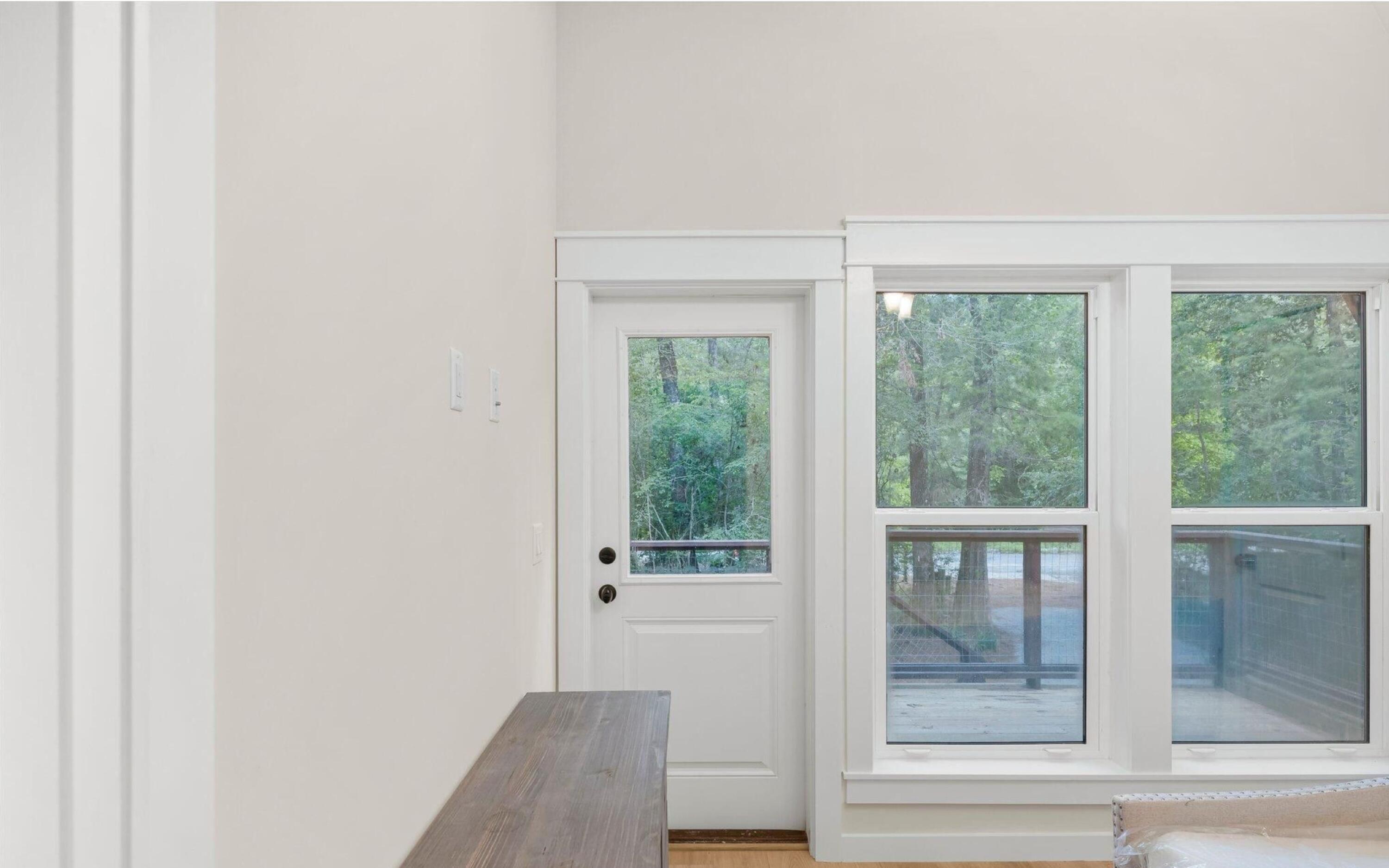 493 Choctawhatchee River Road Ponce de Leon, FL 32455 - Photo 8 of 35 a view of room with window and front door