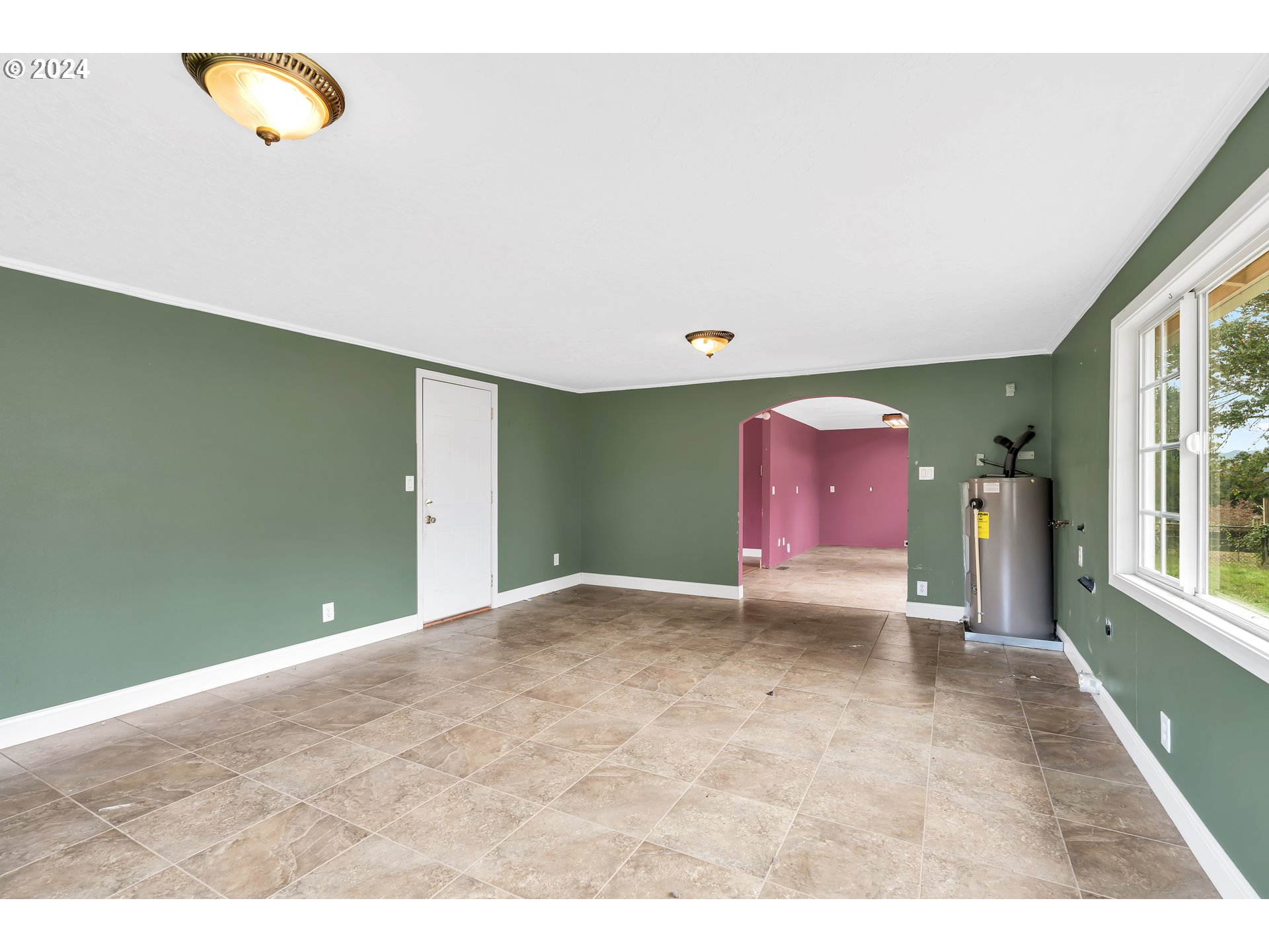 822 Olson Road Longview, WA 98632 - Photo 12 of 27 a view of an empty room with a window