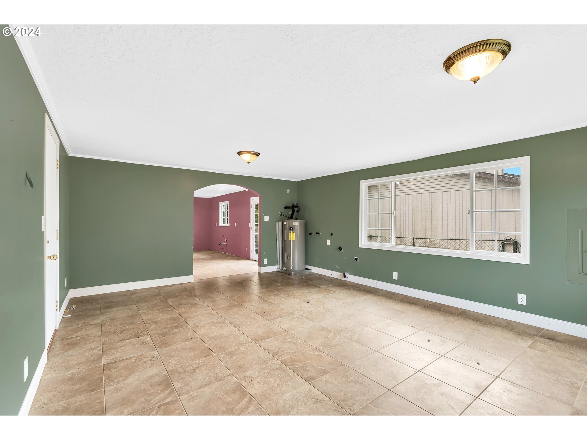 822 Olson Road Longview, WA 98632 - Photo 13 of 27 a view of an empty room with a window