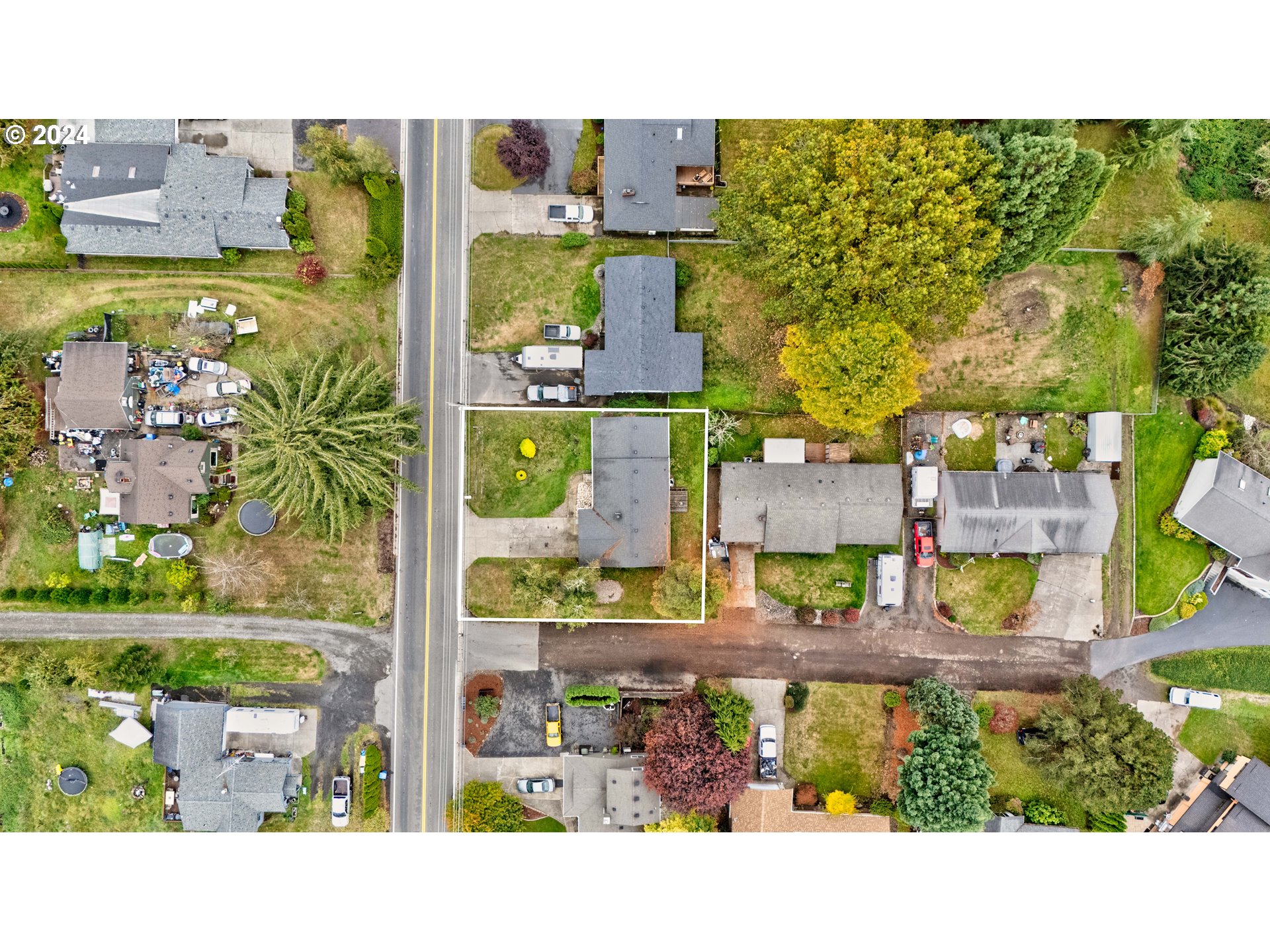 822 Olson Road Longview, WA 98632 - Photo 27 of 27 an aerial view of houses with yard