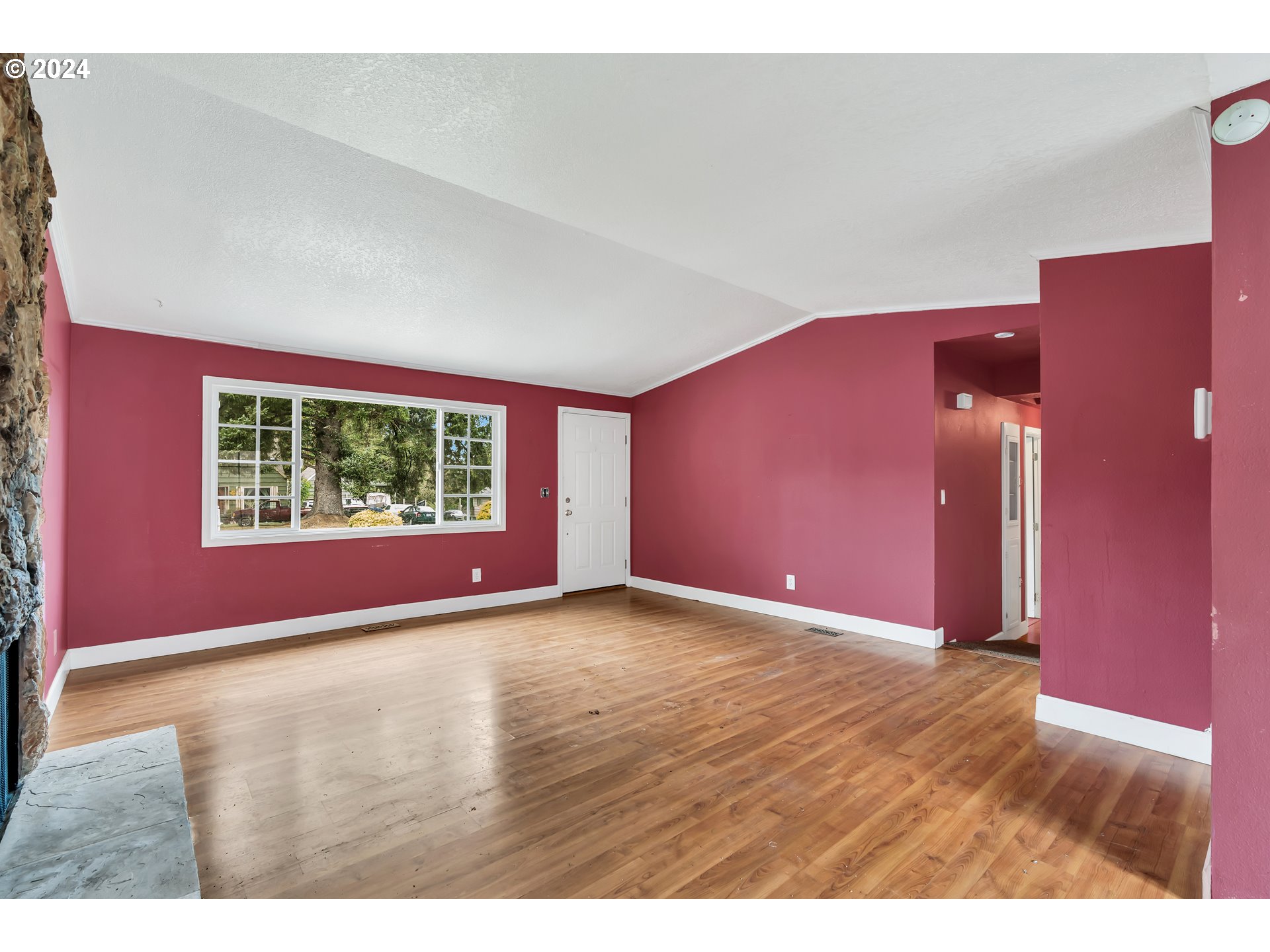 822 Olson Road Longview, WA 98632 - Photo 7 of 27 a view of an empty room with a window