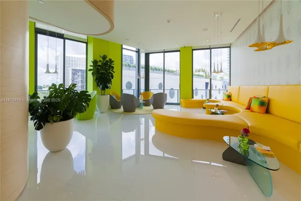 a view of a living room with windows