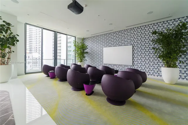 a view of a swimming pool with a lounge chair