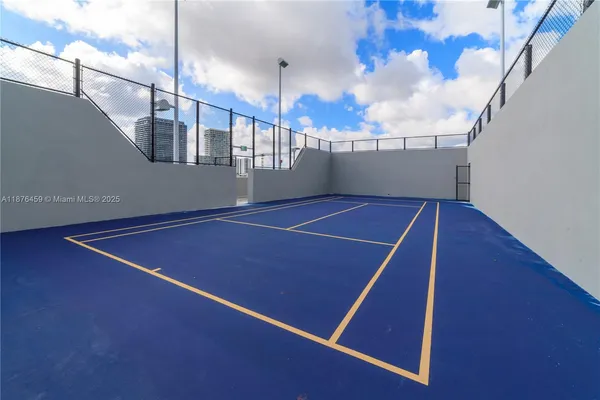 a view of a swimming pool with a yard