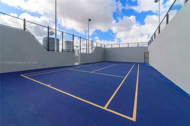 a view of a swimming pool with a yard