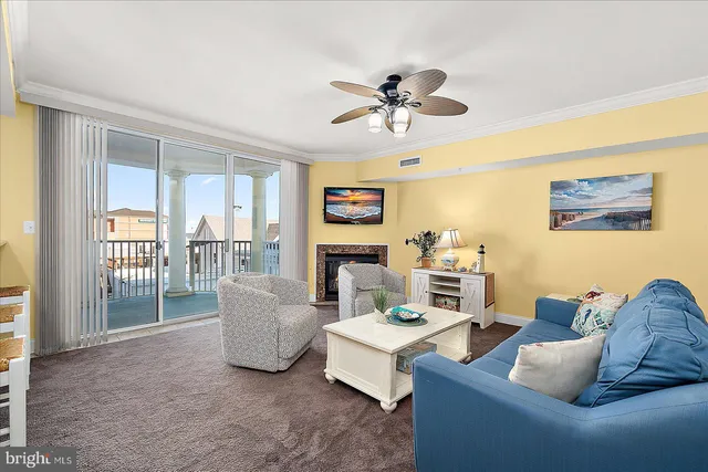 a living room with furniture and a rug