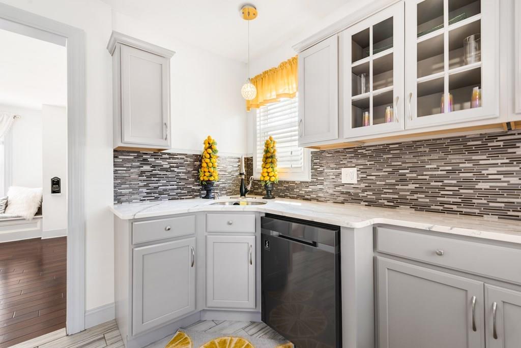 35 Trillium Street Springfield, MA 01108 - Photo 8 of 39 a kitchen with a sink and cabinets