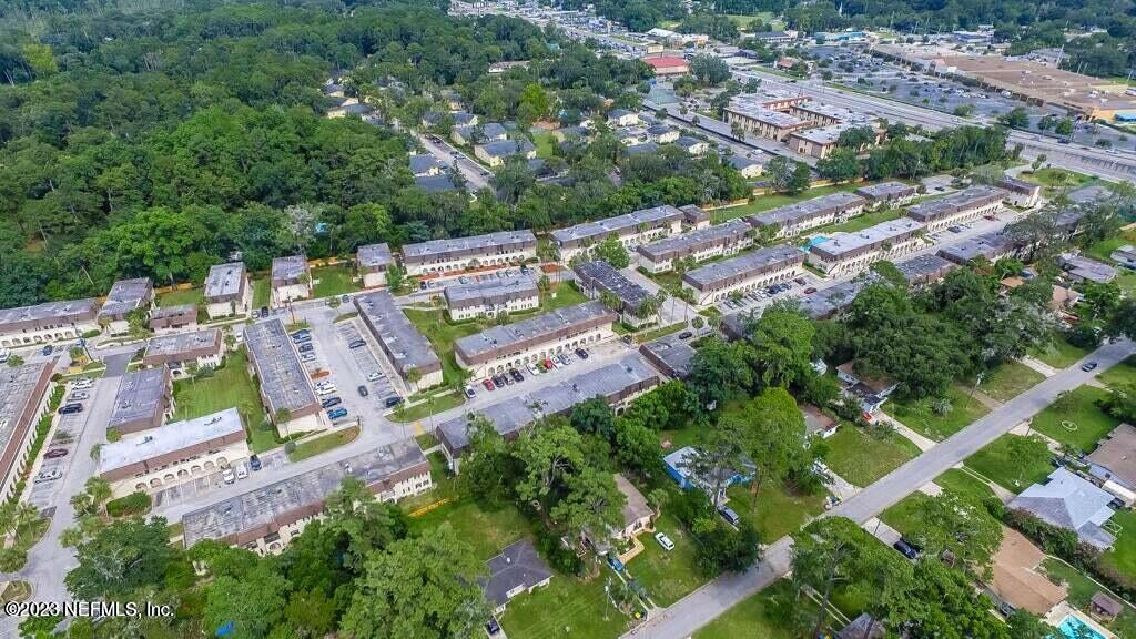 1735 El Camino Road, Unit 5 Jacksonville, FL 32216 - Photo 22 of 26 an aerial view of residential house with outdoor space and trees all around