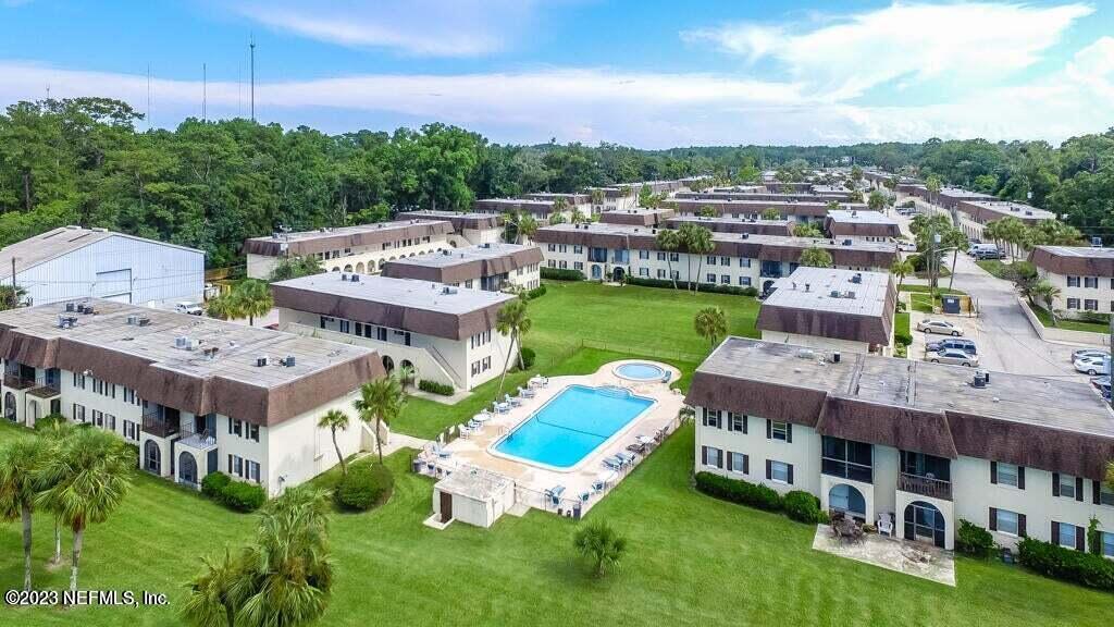 1735 El Camino Road, Unit 5 Jacksonville, FL 32216 - Photo 26 of 26 an aerial view of a house with a garden