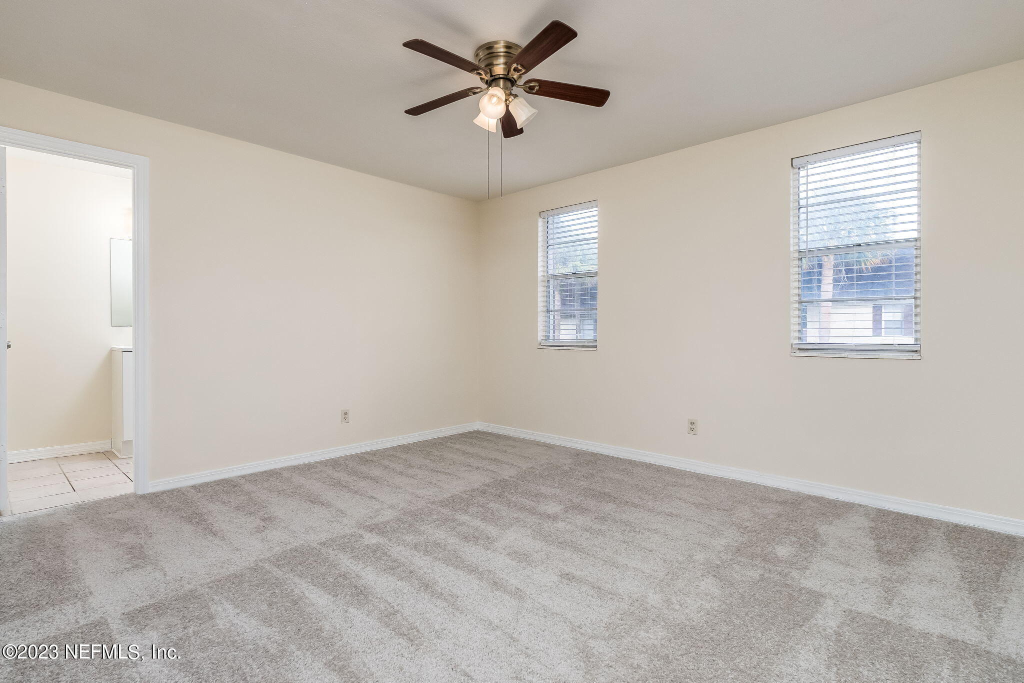 1735 El Camino Road, Unit 5 Jacksonville, FL 32216 - Photo 7 of 26 a view of an empty room with a window