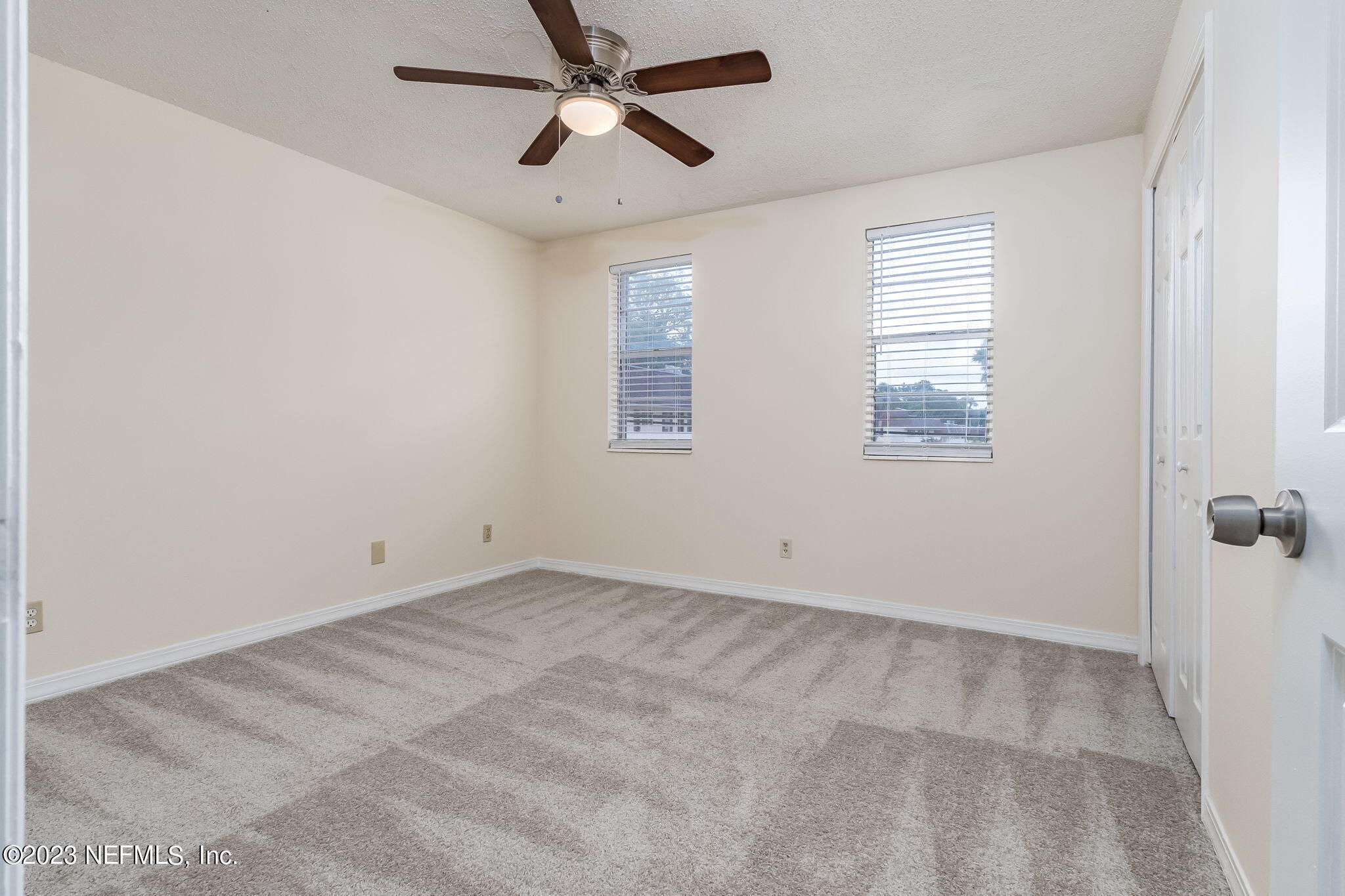 1735 El Camino Road, Unit 5 Jacksonville, FL 32216 - Photo 9 of 26 a view of an empty room with a window