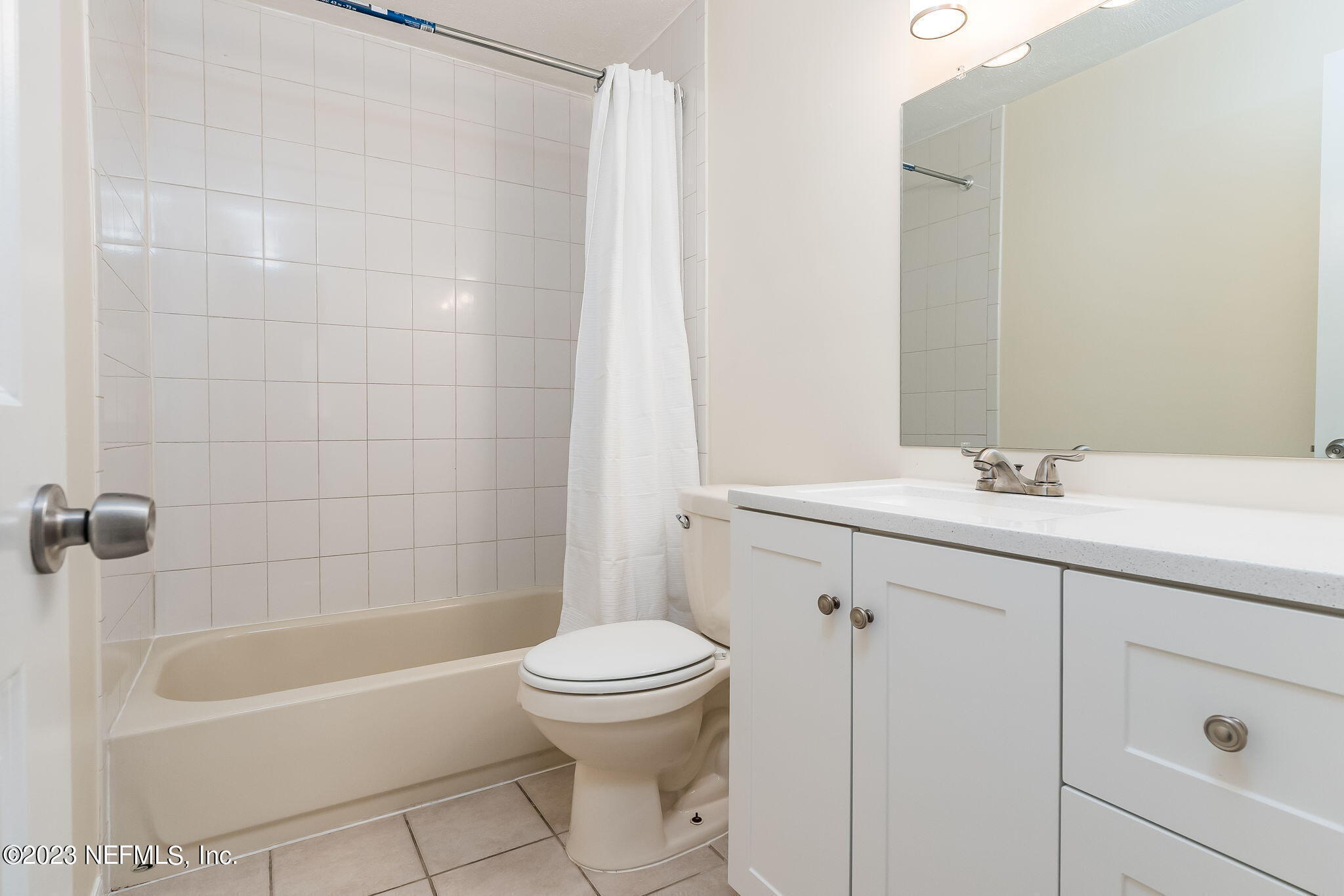 1735 El Camino Road, Unit 5 Jacksonville, FL 32216 - Photo 10 of 26 a bathroom with a sink a toilet and shower