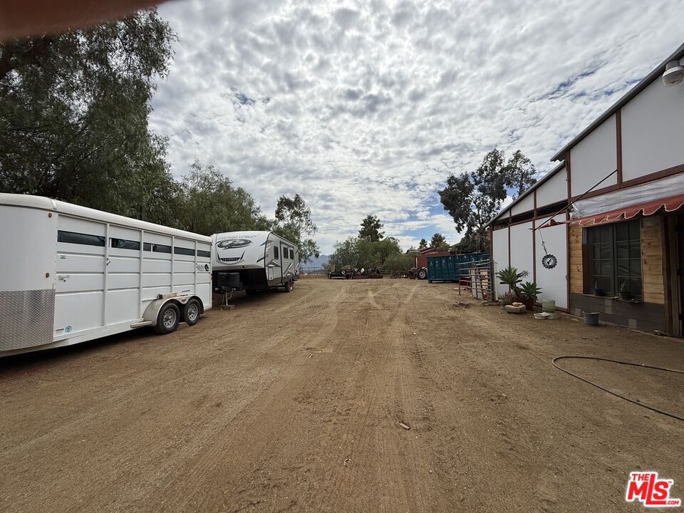 33931 Hanawalt Road Agua Dulce, CA 91390 - Photo 3 of 22 a view of a street with cars on the road