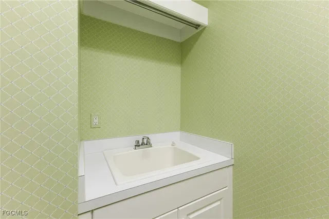 a utility room with a sink