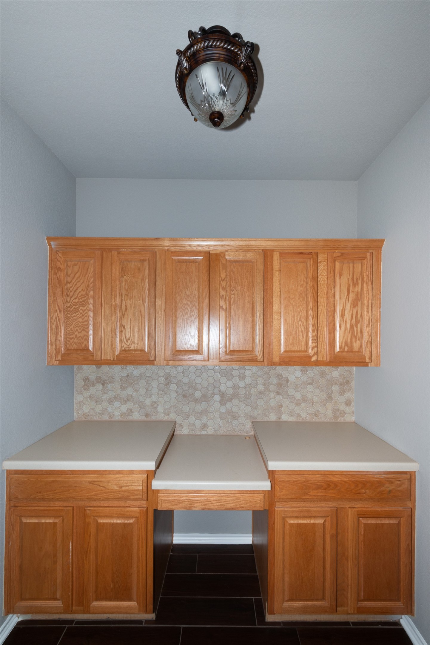 184 Tulip Cove Kyle, TX 78640 - Photo 14 of 40 a kitchen with a sink and a cabinet