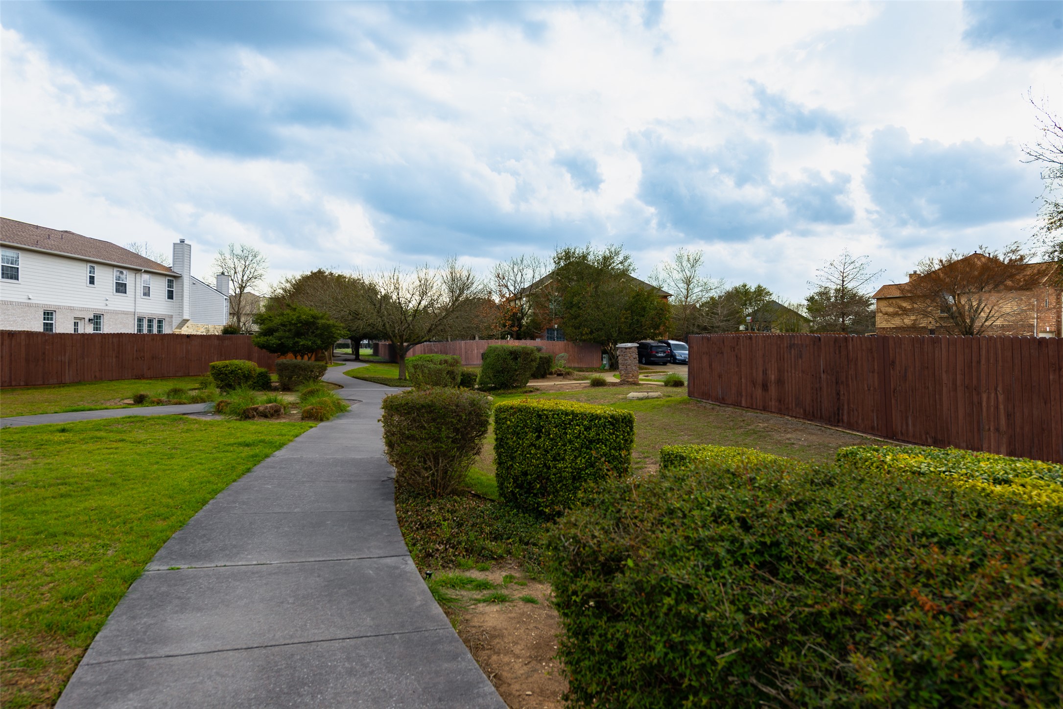 184 Tulip Cove Kyle, TX 78640 - Photo 39 of 40 a view of a garden with sitting area
