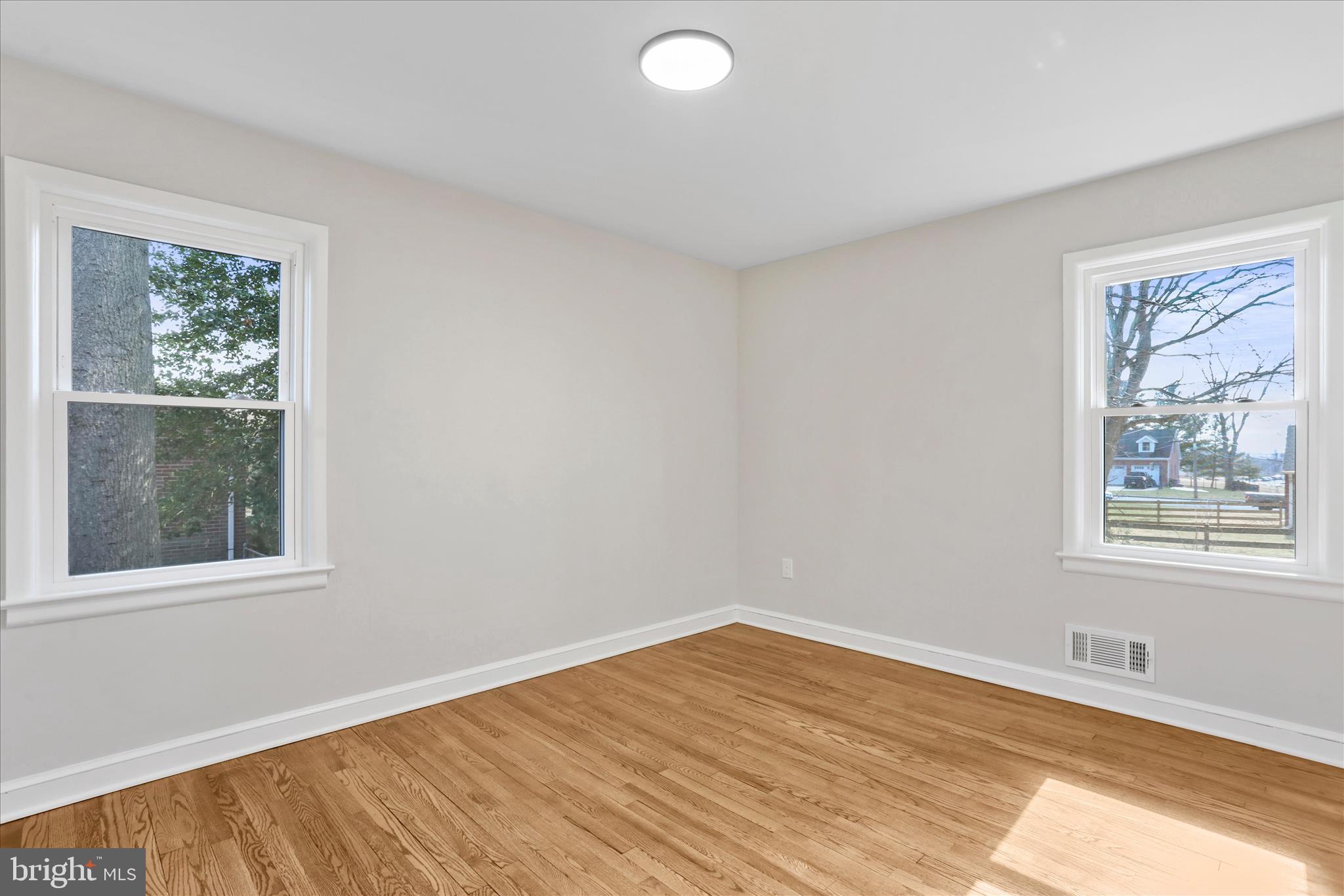 10 Linden Boulevard Middletown, MD 21769 - Photo 13 of 28 a view of empty room with wooden floor and fan