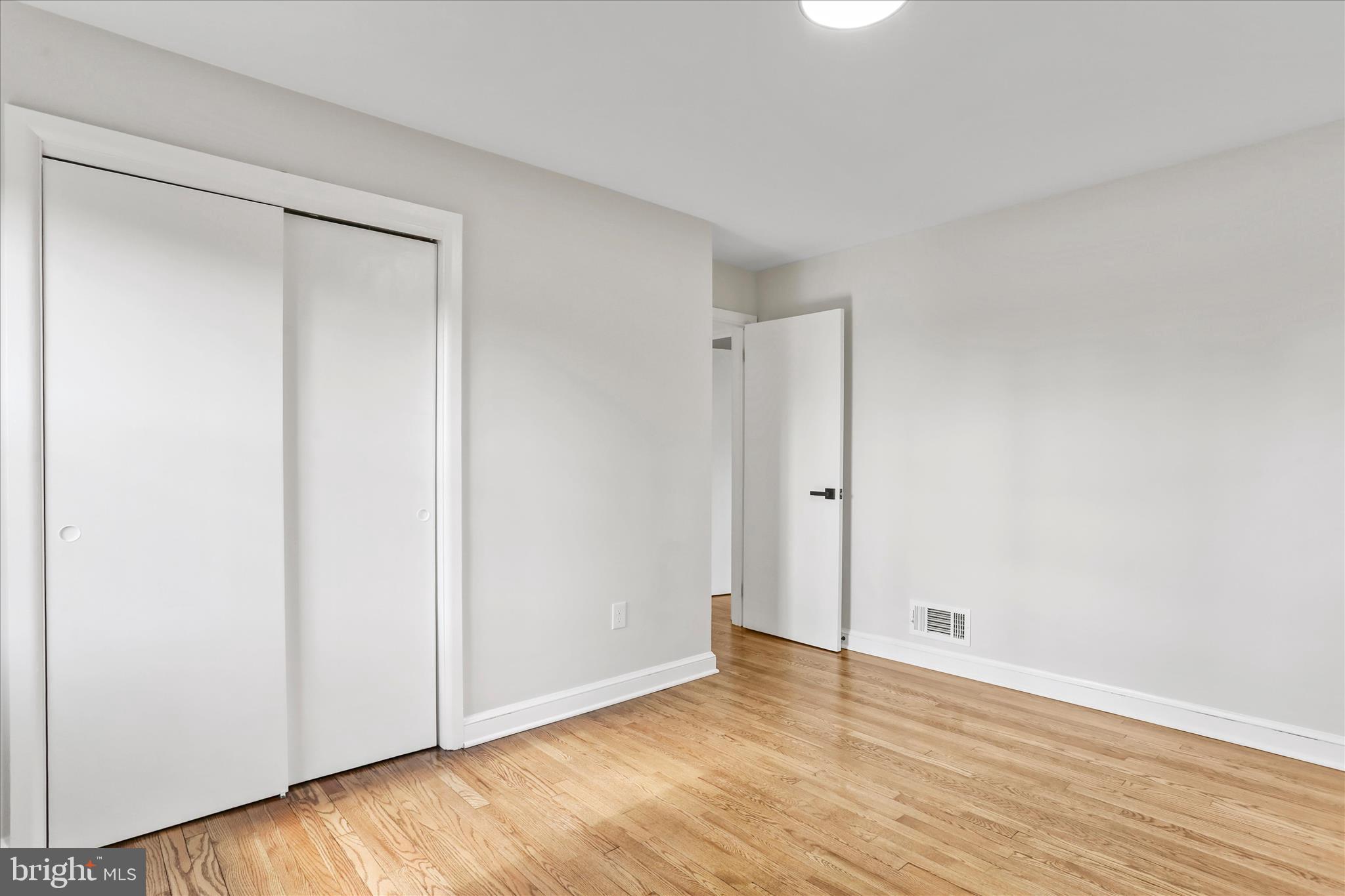 10 Linden Boulevard Middletown, MD 21769 - Photo 14 of 28 a view of an empty room with wooden floor