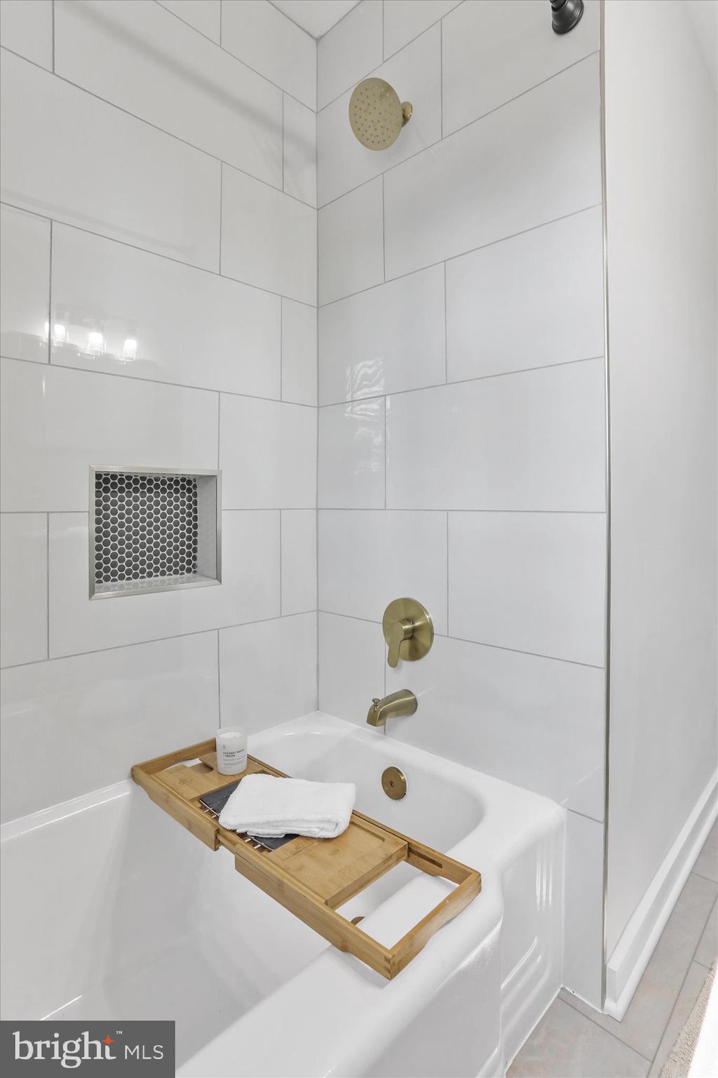 10 Linden Boulevard Middletown, MD 21769 - Photo 16 of 28 a bathroom with a tub and a sink