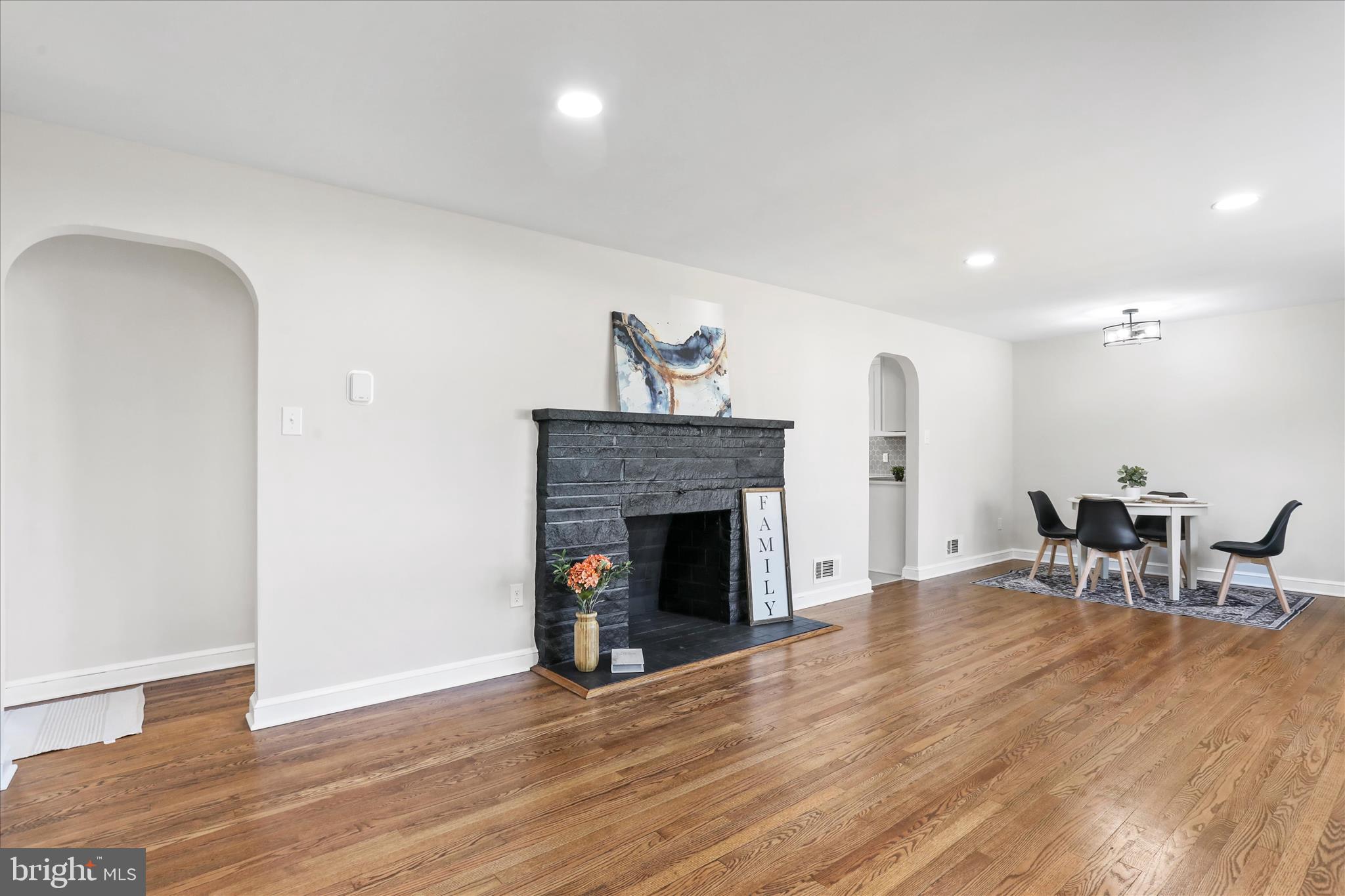 10 Linden Boulevard Middletown, MD 21769 - Photo 3 of 28 a living room with furniture and a fireplace