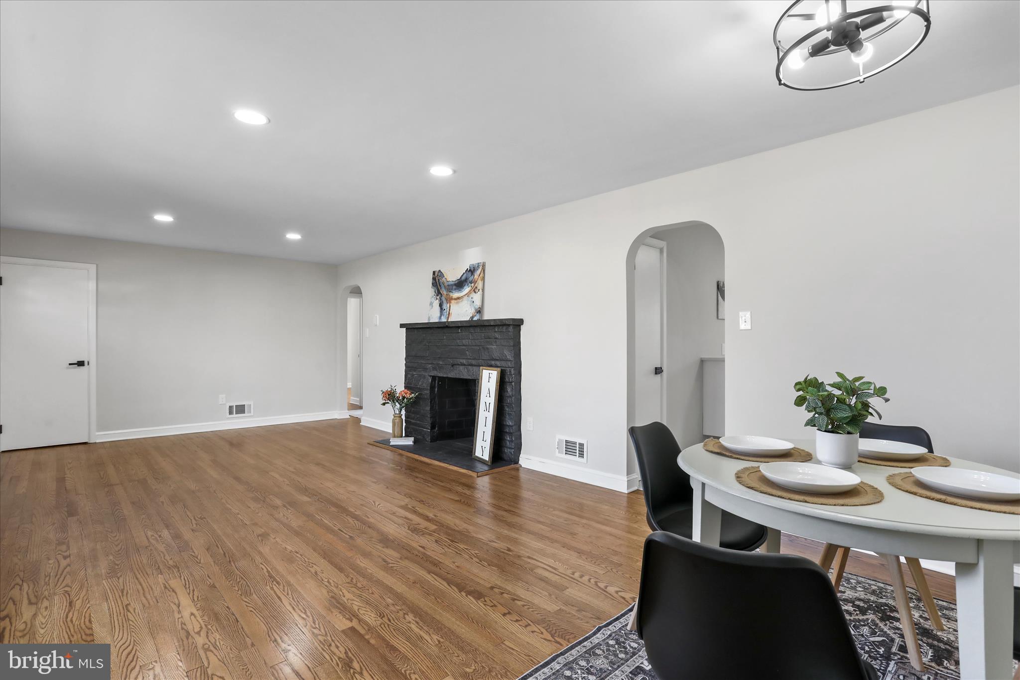 10 Linden Boulevard Middletown, MD 21769 - Photo 5 of 28 a living room with furniture and a fireplace