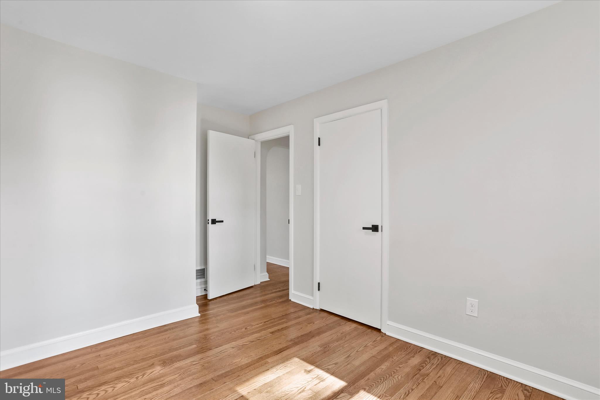 10 Linden Boulevard Middletown, MD 21769 - Photo 10 of 28 a view of an empty room with wooden floor