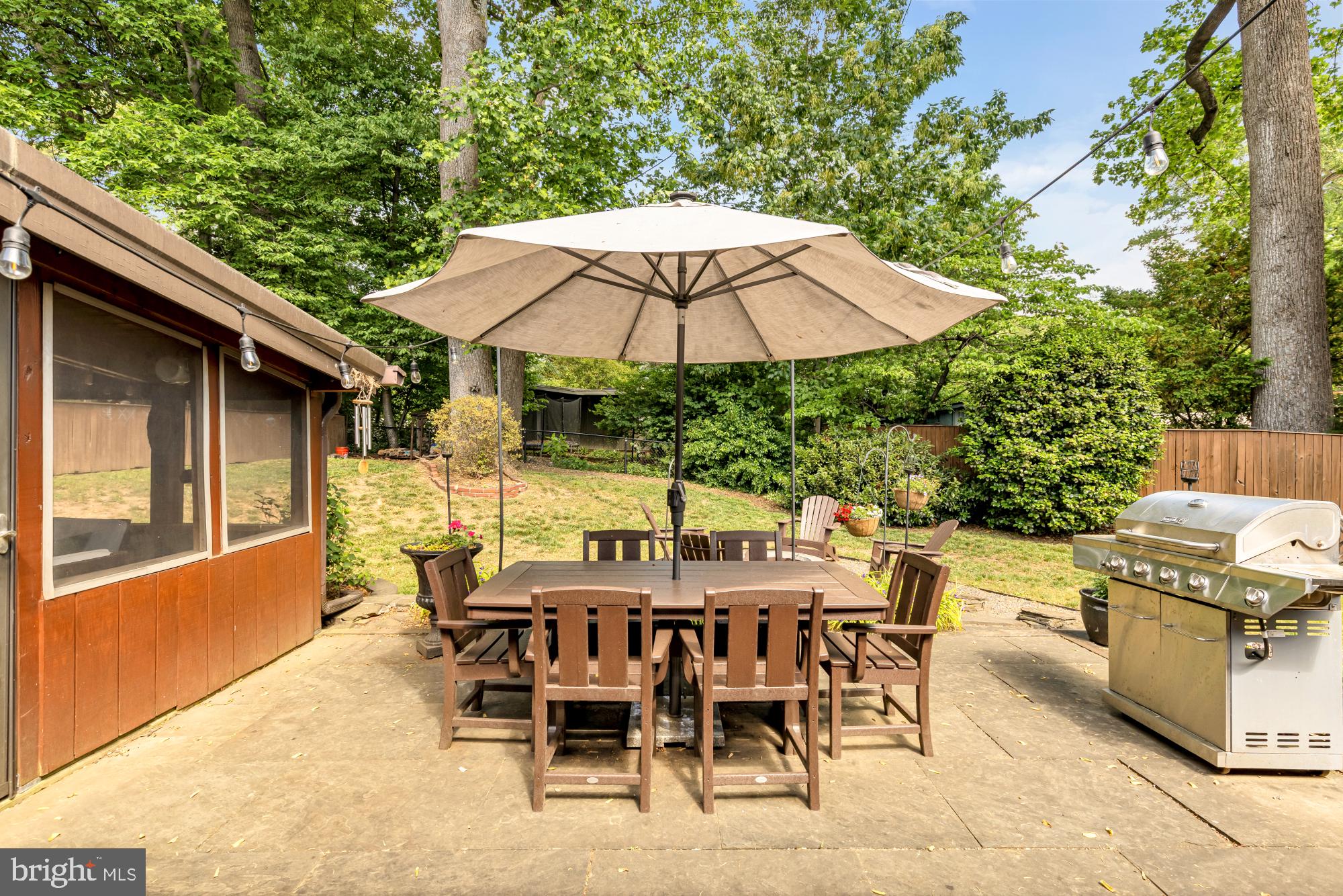 3018 Pine Spring Road Falls Church, VA 22042 - Photo 42 of 52 an outdoor space with furniture and umbrella