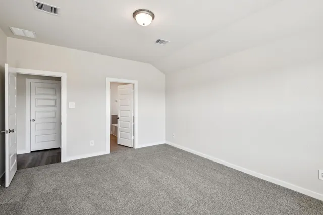 a bathroom with a double vanity sink and mirror