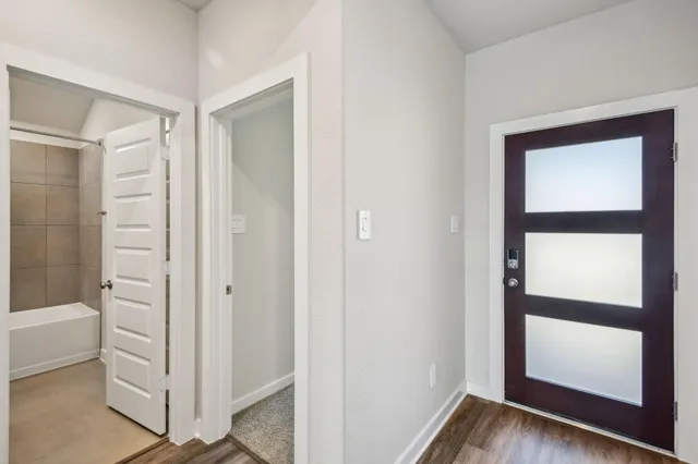a view of front door with hallway