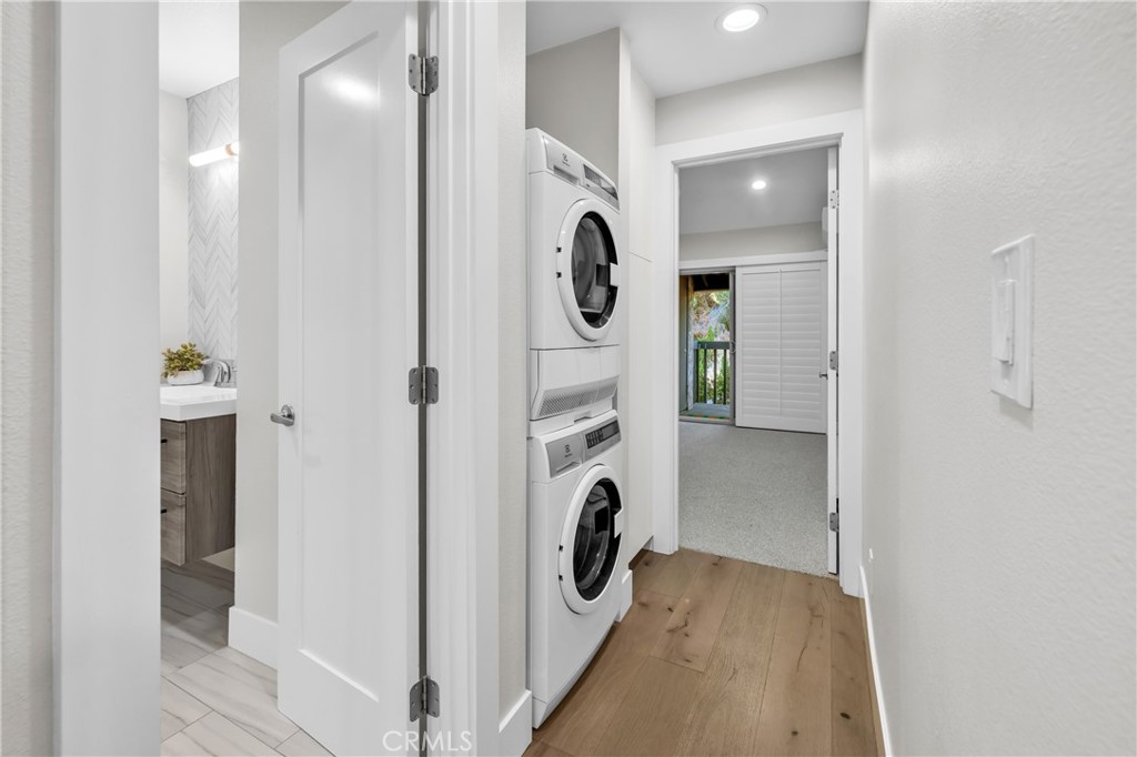 7890 East Spring Street, Unit 10F Long Beach, CA 90815 - Photo 20 of 31 a view of living room washer and dryer