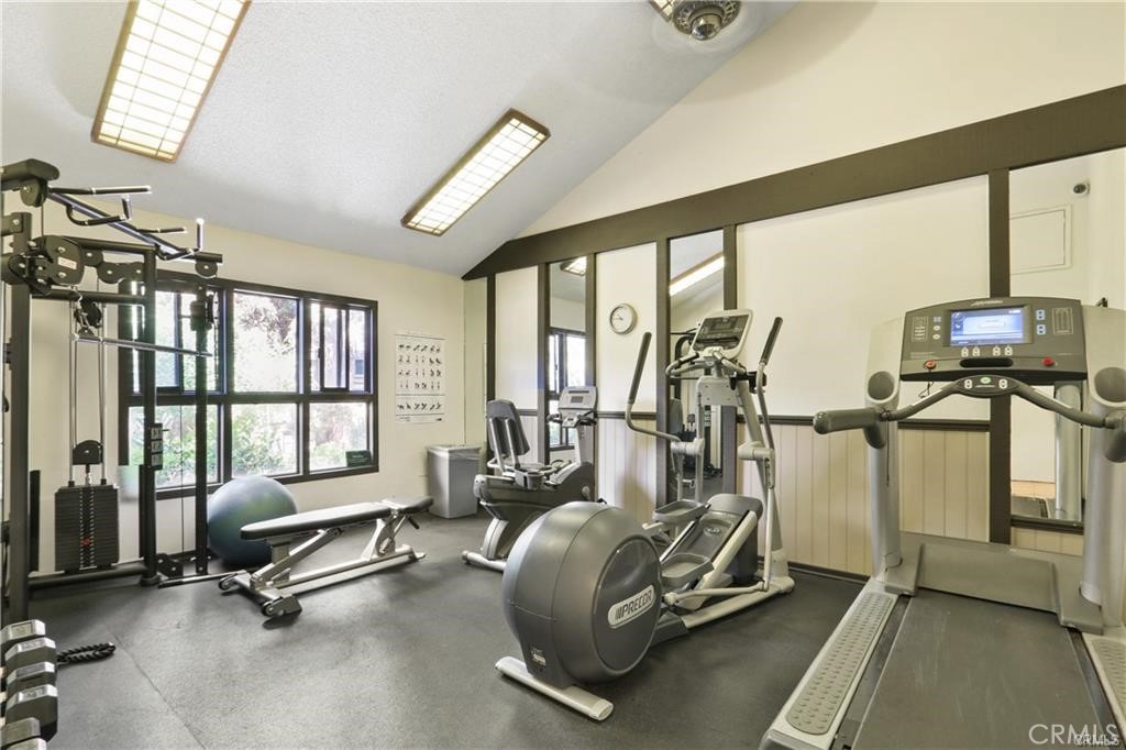 7890 East Spring Street, Unit 10F Long Beach, CA 90815 - Photo 30 of 31 a view of a room with gym equipment
