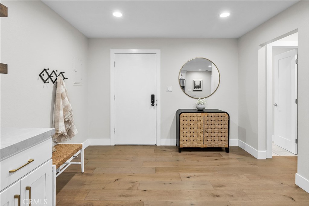 7890 East Spring Street, Unit 10F Long Beach, CA 90815 - Photo 6 of 31 a view of room with a table and chairs