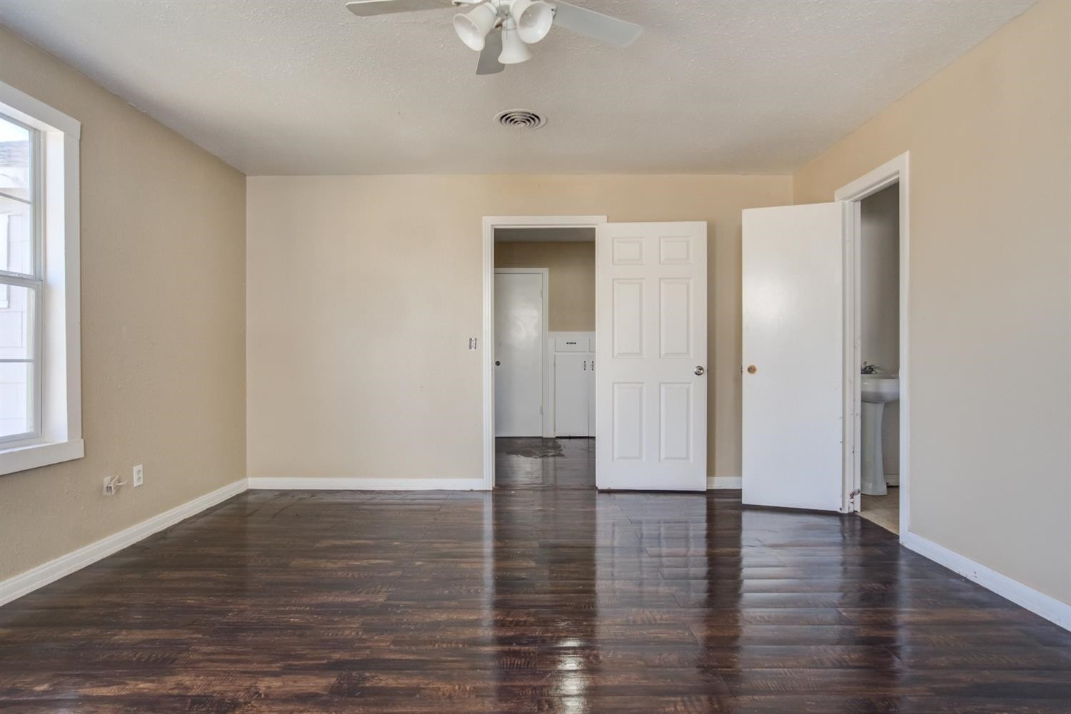 526 53rd Street Lubbock, TX 79404 - Photo 20 of 28 wooden floor in an empty room with a window