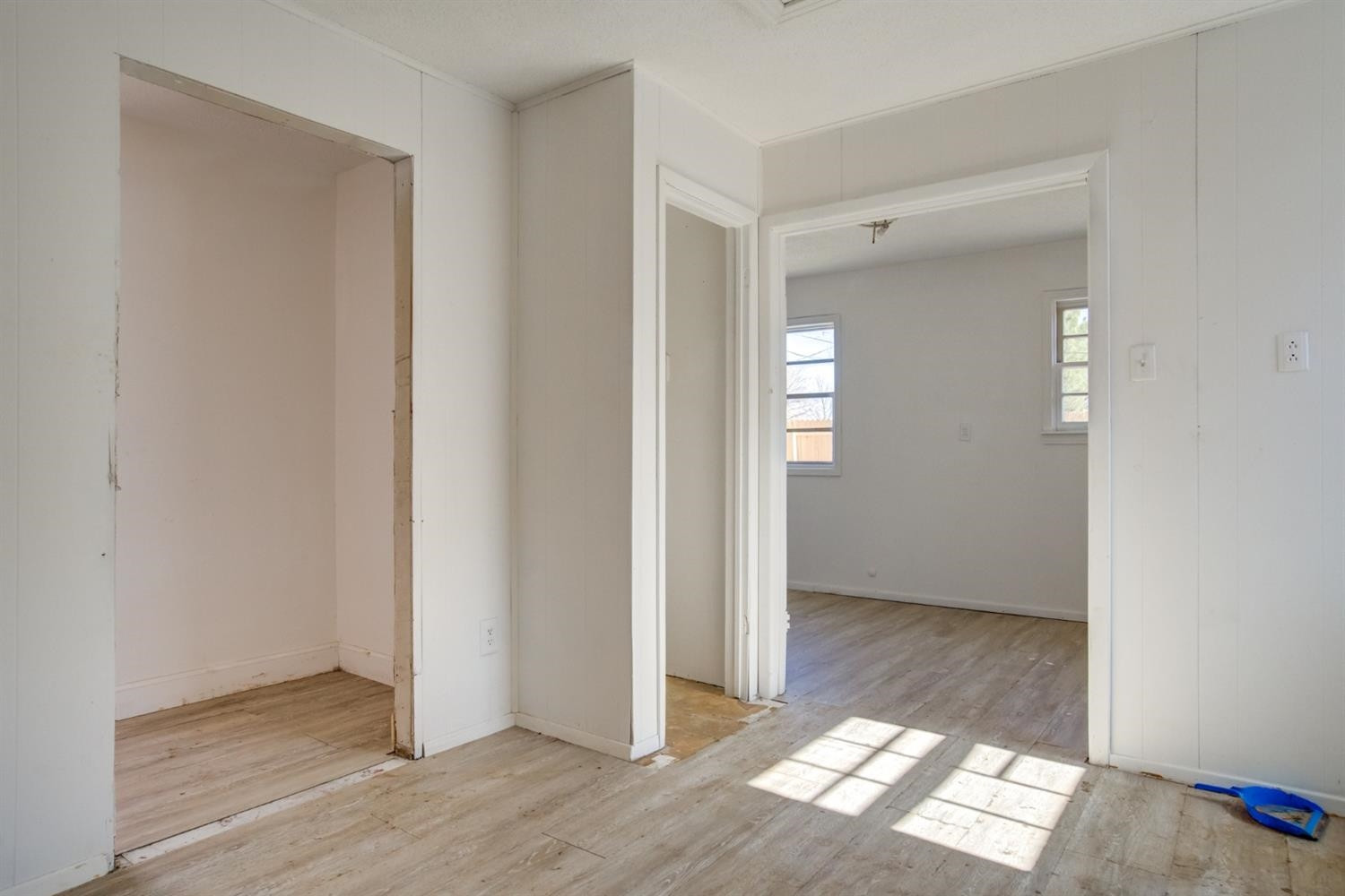 526 53rd Street Lubbock, TX 79404 - Photo 28 of 28 an empty room with wooden floor & windows