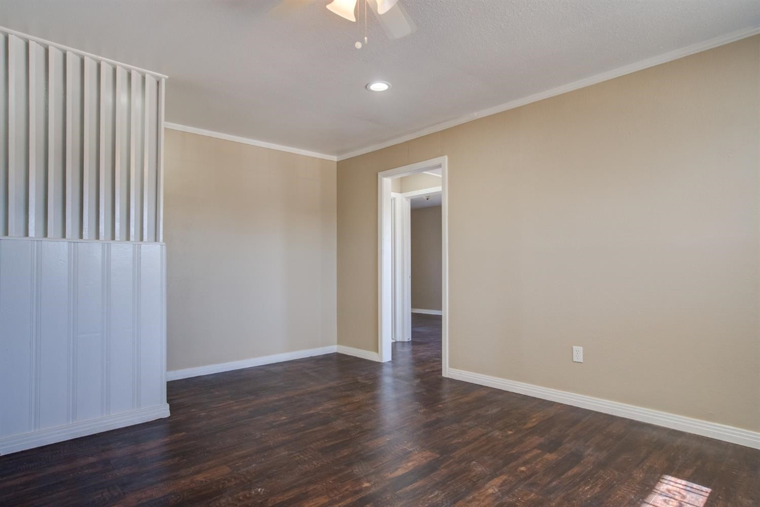 526 53rd Street Lubbock, TX 79404 - Photo 3 of 28 a view of an empty room with wooden floor