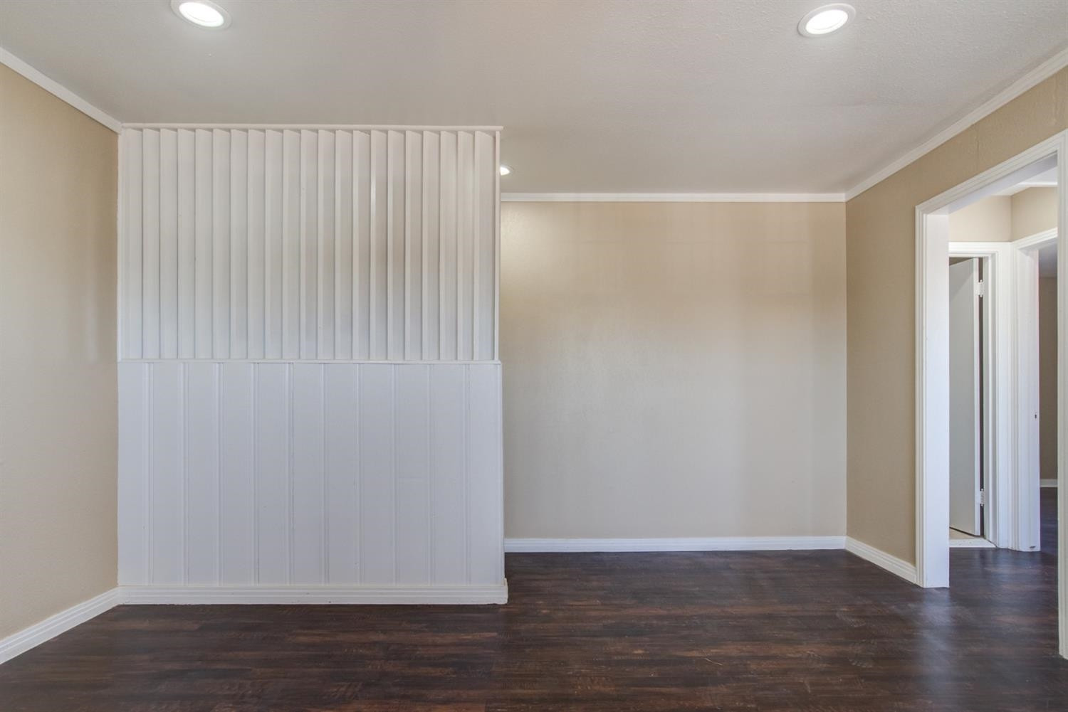 526 53rd Street Lubbock, TX 79404 - Photo 4 of 28 a view of an empty room with wooden floor