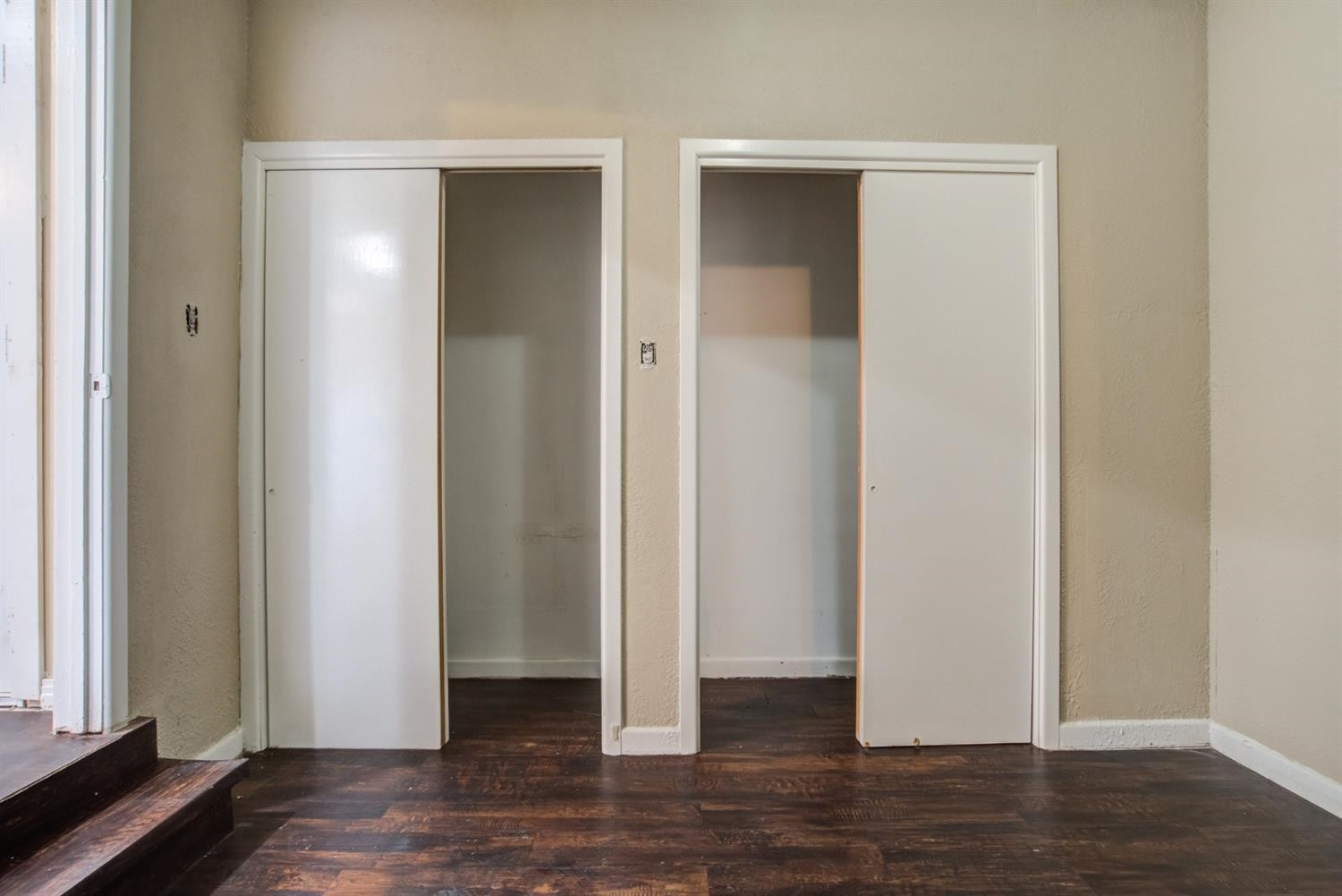 526 53rd Street Lubbock, TX 79404 - Photo 7 of 28 an empty room with wooden floor and closet