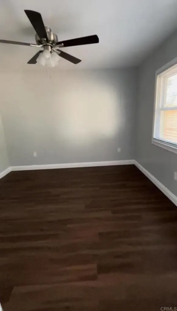 1419 Flo Drive Alpine, CA 91901 - Photo 24 of 27 a view of a room with wooden floor and a window