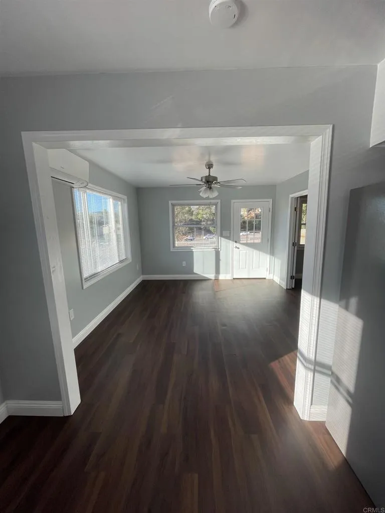 1419 Flo Drive Alpine, CA 91901 - Photo 6 of 27 a view of livingroom with hardwood floor and window