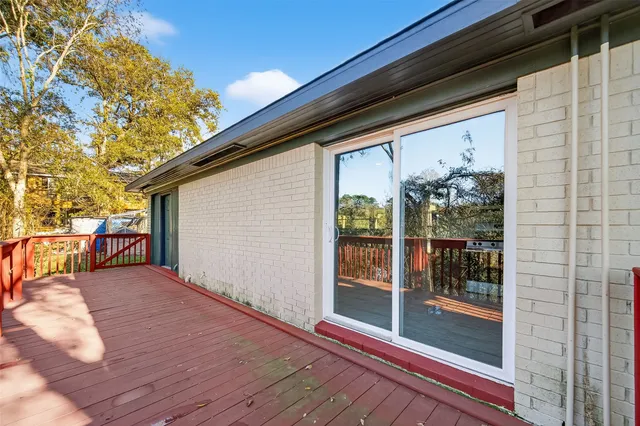 a view of backyard with porch