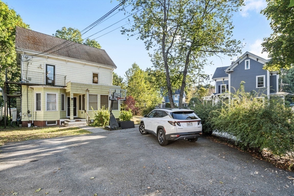 a car parked in front of a house