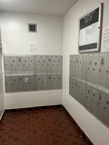 a bathroom with bathtub and shower