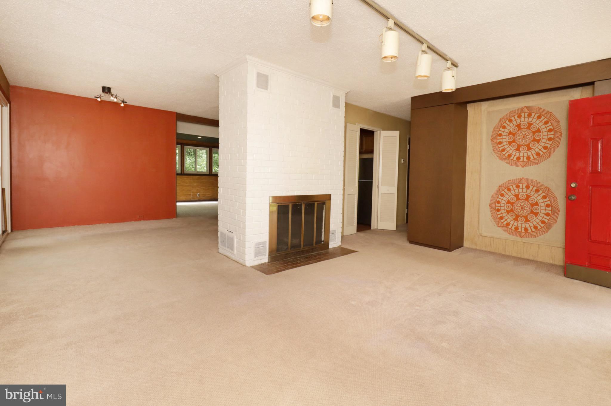 7817 Fort Hunt Road Alexandria, VA 22308 - Photo 6 of 51 Living Room with Wood Fireplace