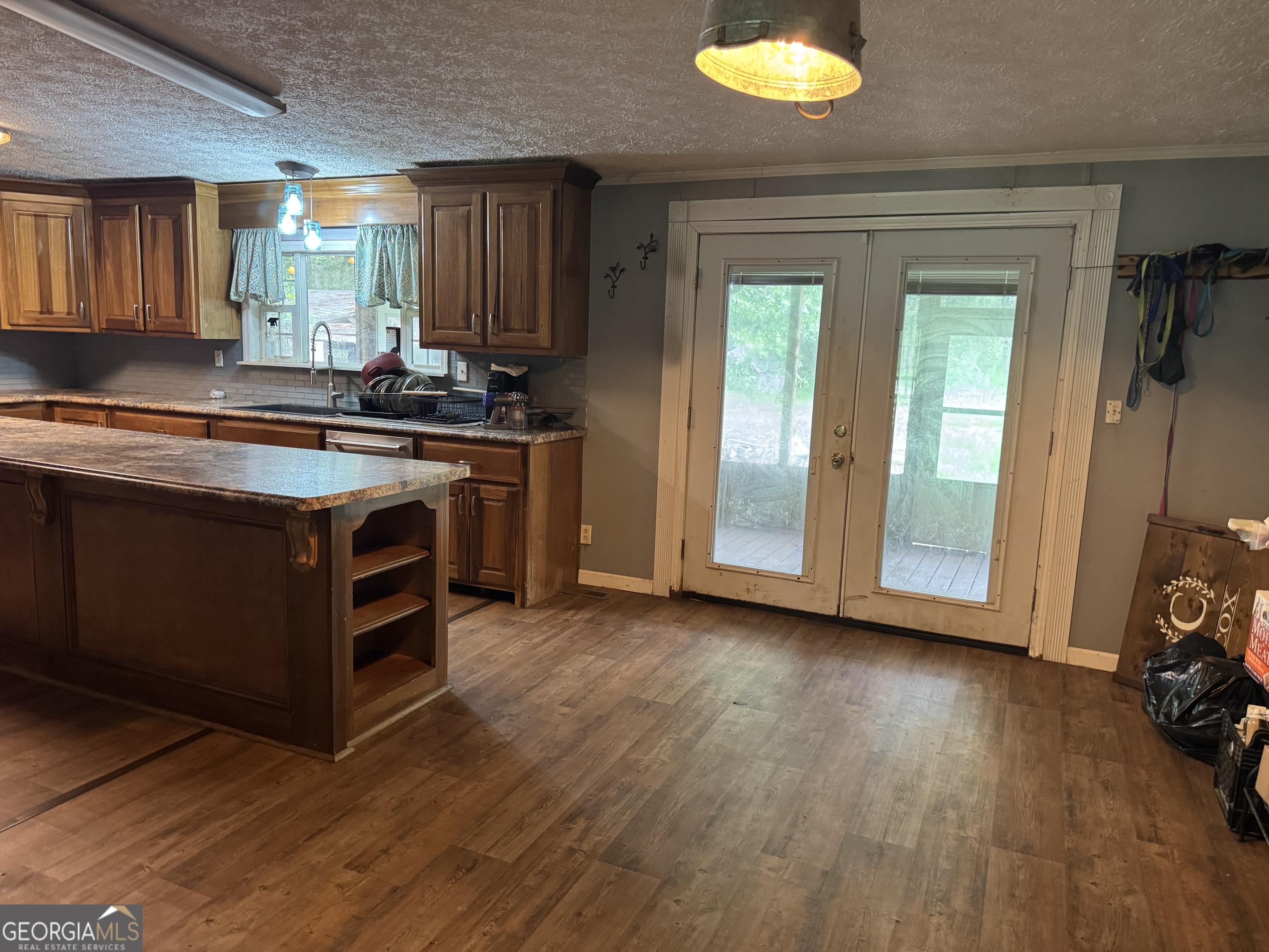 361 Le Stanfield Road Glennville, GA 30427 - Photo 13 of 22 Space for a large table in the kitchen