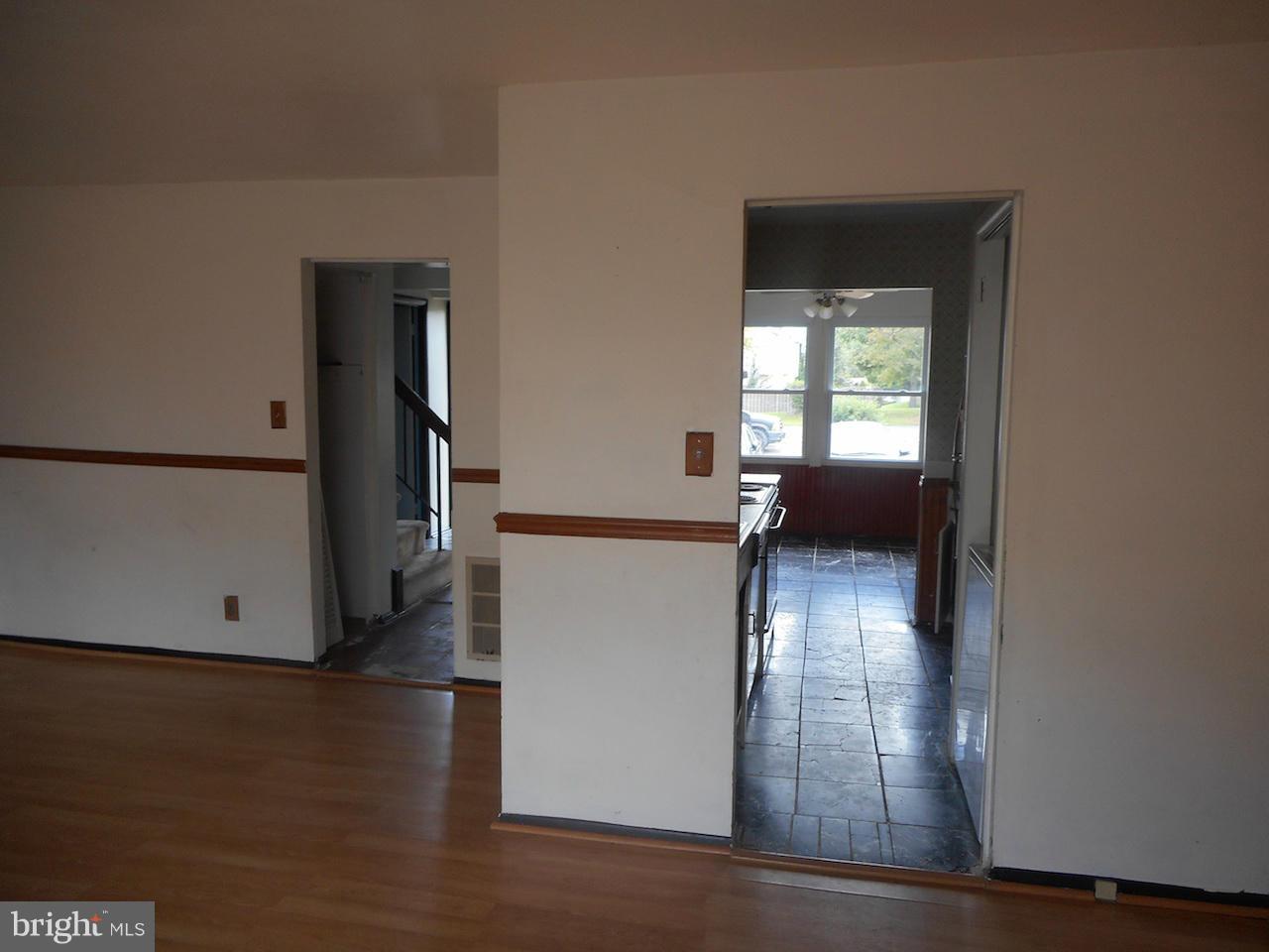 17518 Hoskinson Road Poolesville, MD 20837 - Photo 11 of 22 a view of empty room with wooden floor