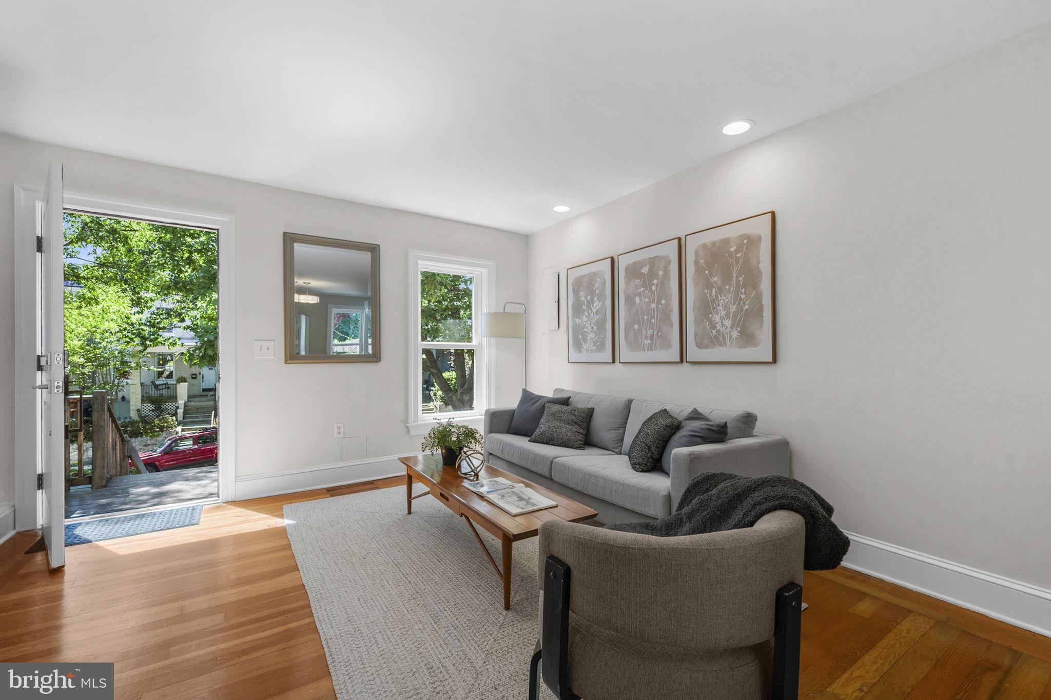 914 15th Street Southeast Washington, DC 20003 - Photo 4 of 37 a living room with furniture and a window