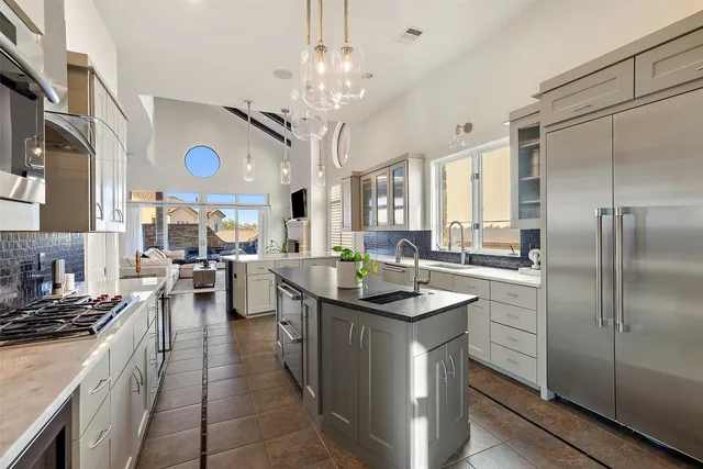 a kitchen with counter space cabinets and stainless steel appliances