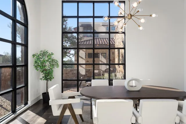 a view of a dining room with furniture and window