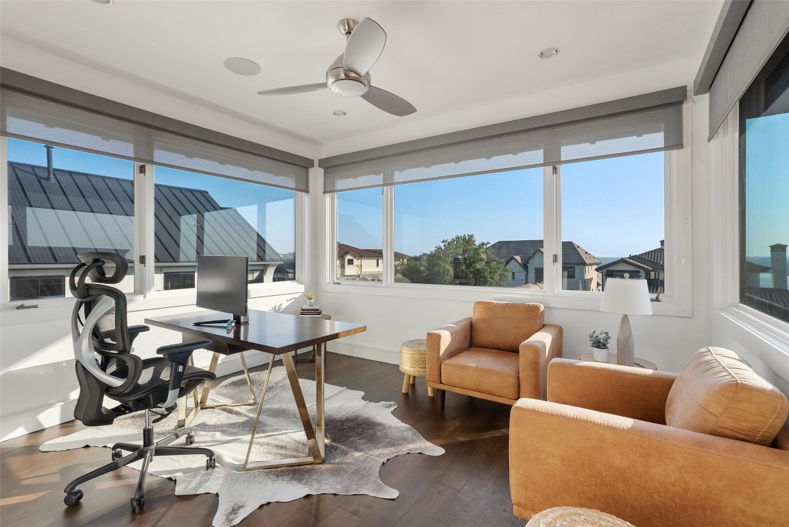 7025 Cielo Azul Pass Austin, TX 78732 - Photo 23 of 35 a living room with furniture and a large window