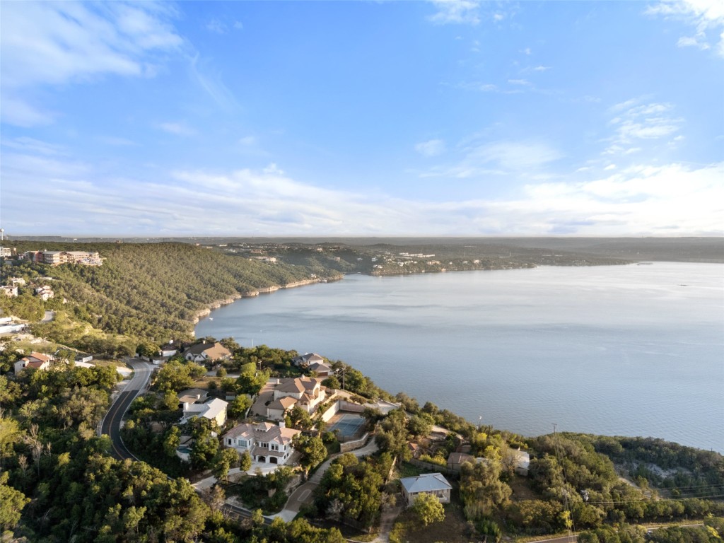 7025 Cielo Azul Pass Austin, TX 78732 - Photo 3 of 35 a view of an ocean and beach